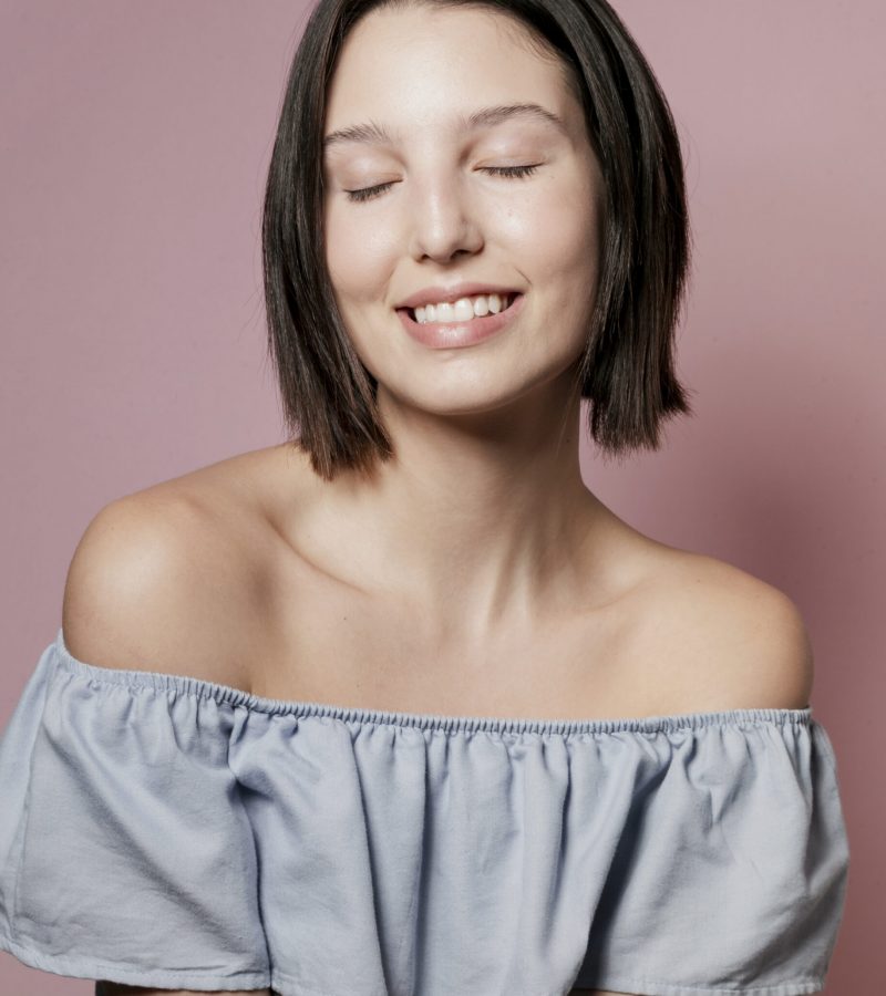 happy-model-with-eyes-closed