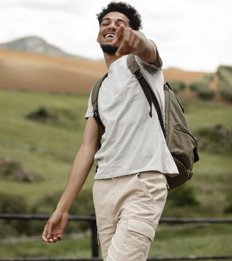 smiley-man-outdoors-medium-shot