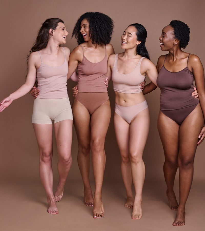 Women diversity, body positivity and happy hug of a group of model friends smile about skin beauty. Wellness, solidarity and proud woman community celebrate skincare, natural cosmetics and health.